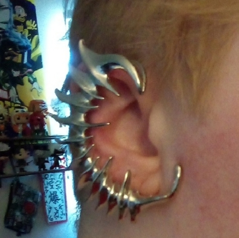 A Set of Silver Toned Spike Hoop Earrings, no piercing, New. (2 for $30)